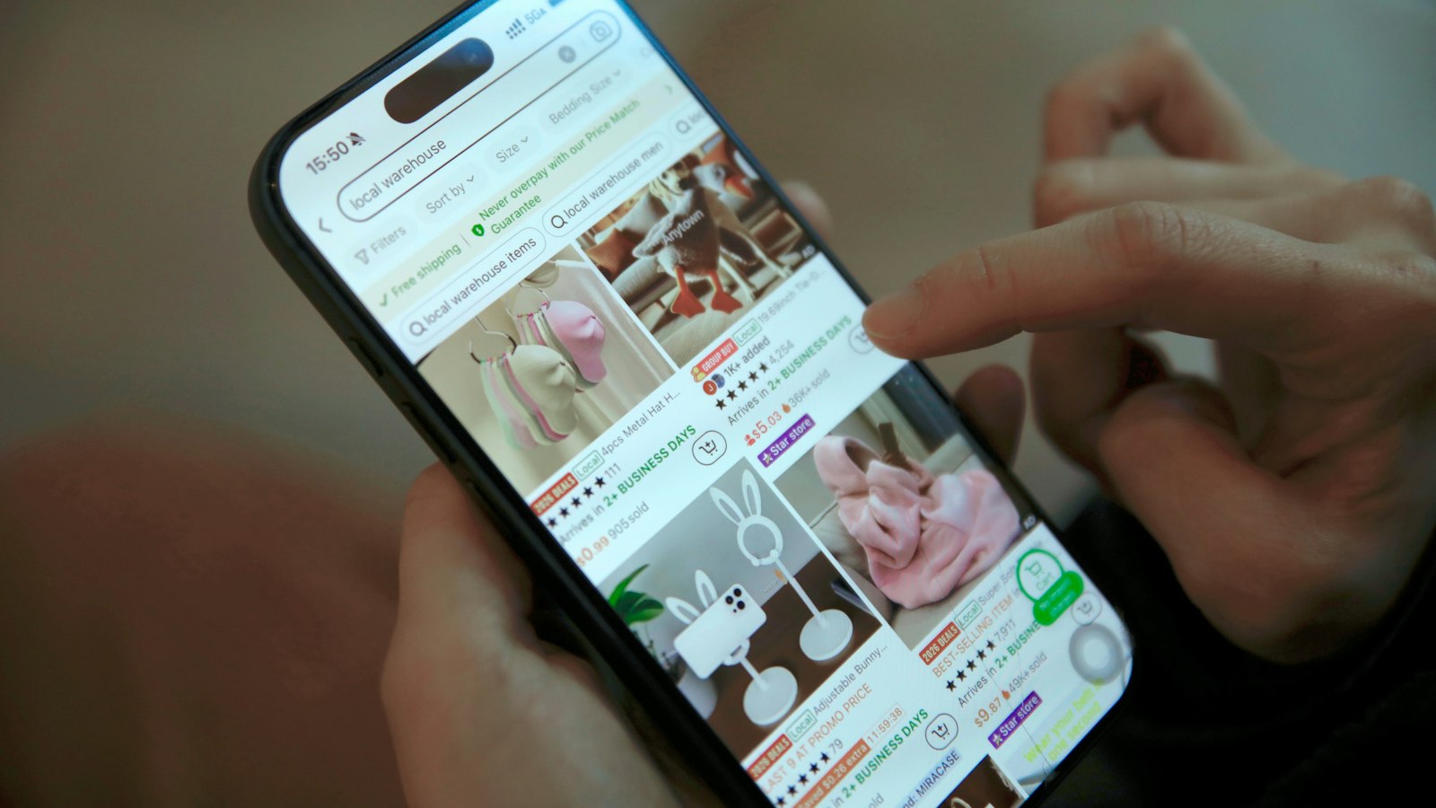 Person browsing an online store on a smartphone